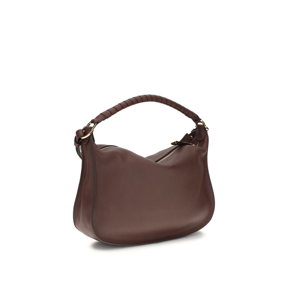 Shoulder bag Bos Taurus in bordeaux calfskin