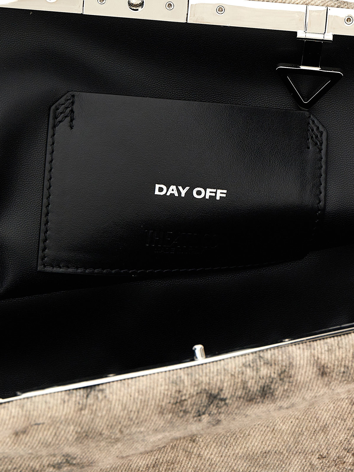 Grey leather clutch